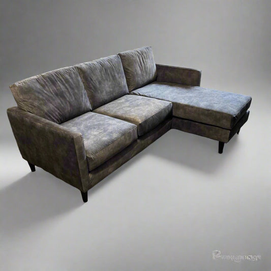 Loft corner chaise sofa in a vintage grey on dark wooden feet. supportive foam available to try before you buy in our Lancaster, Lancashire showroom
