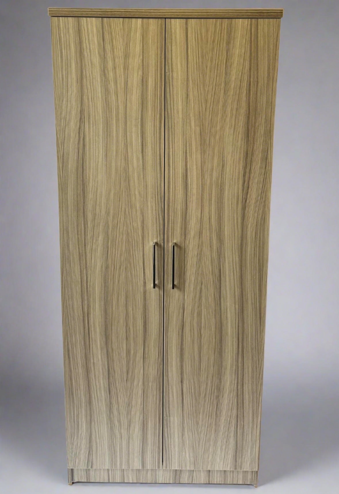 Front view of Mode 2 door wardrobe. Luxury bedroom storage solution with soft close doors, shelving and hanging space.