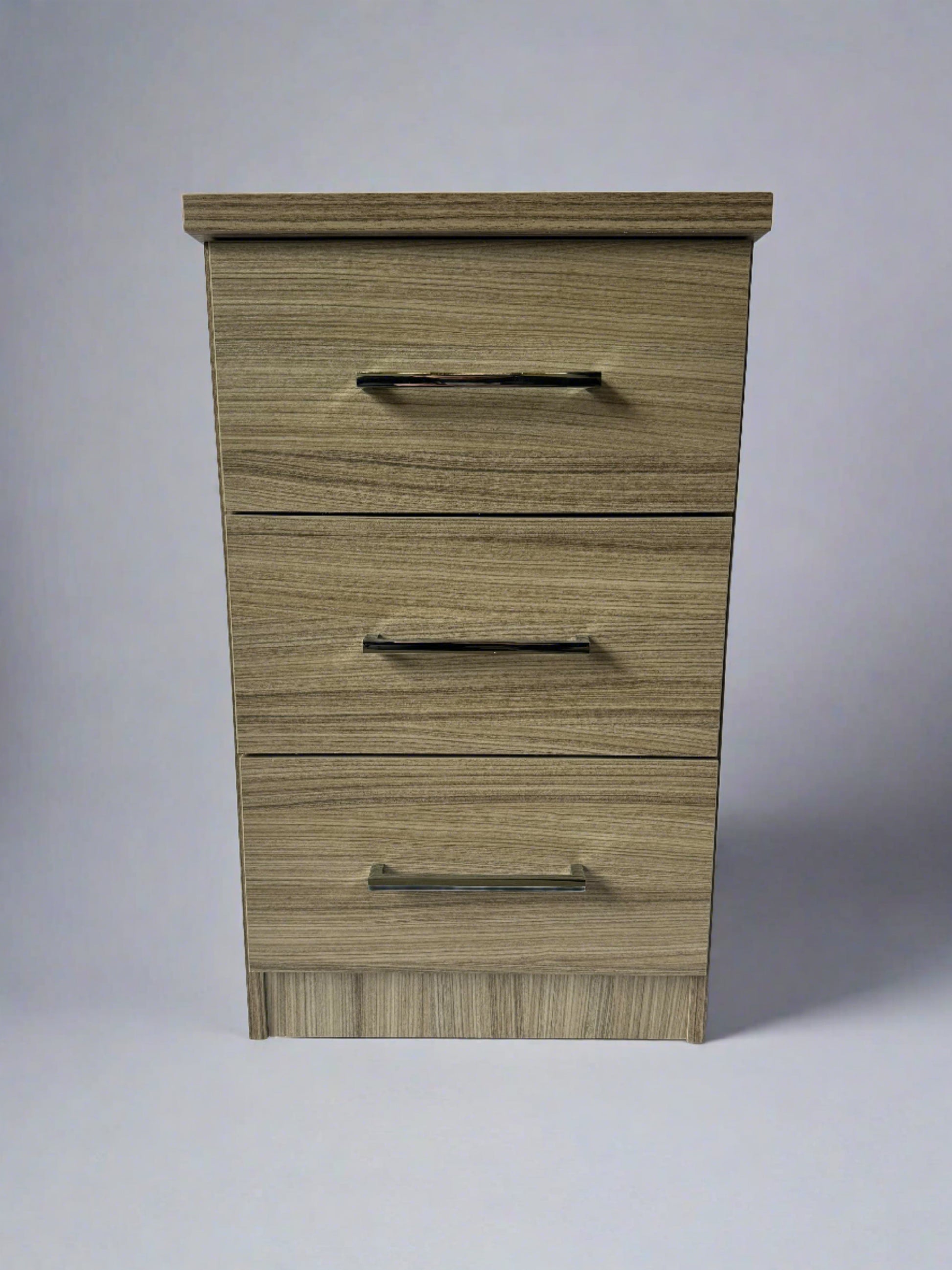 Mode 3 Drawer Bedside table in Driftwood finish. Luxury bedroom furniture at low cost.