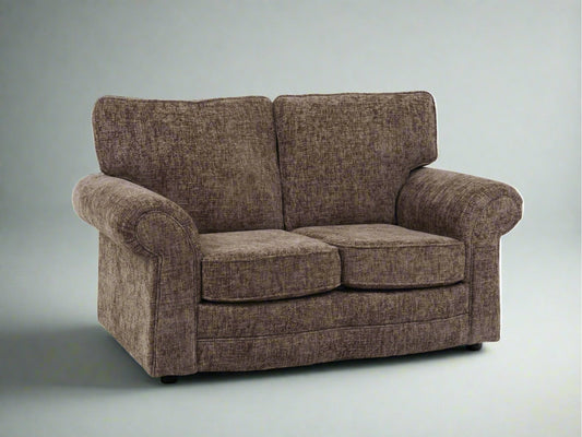 UK made Devon 2 seater sofa. Curved arms perfect for sleeping with supportive cushions and seats. 