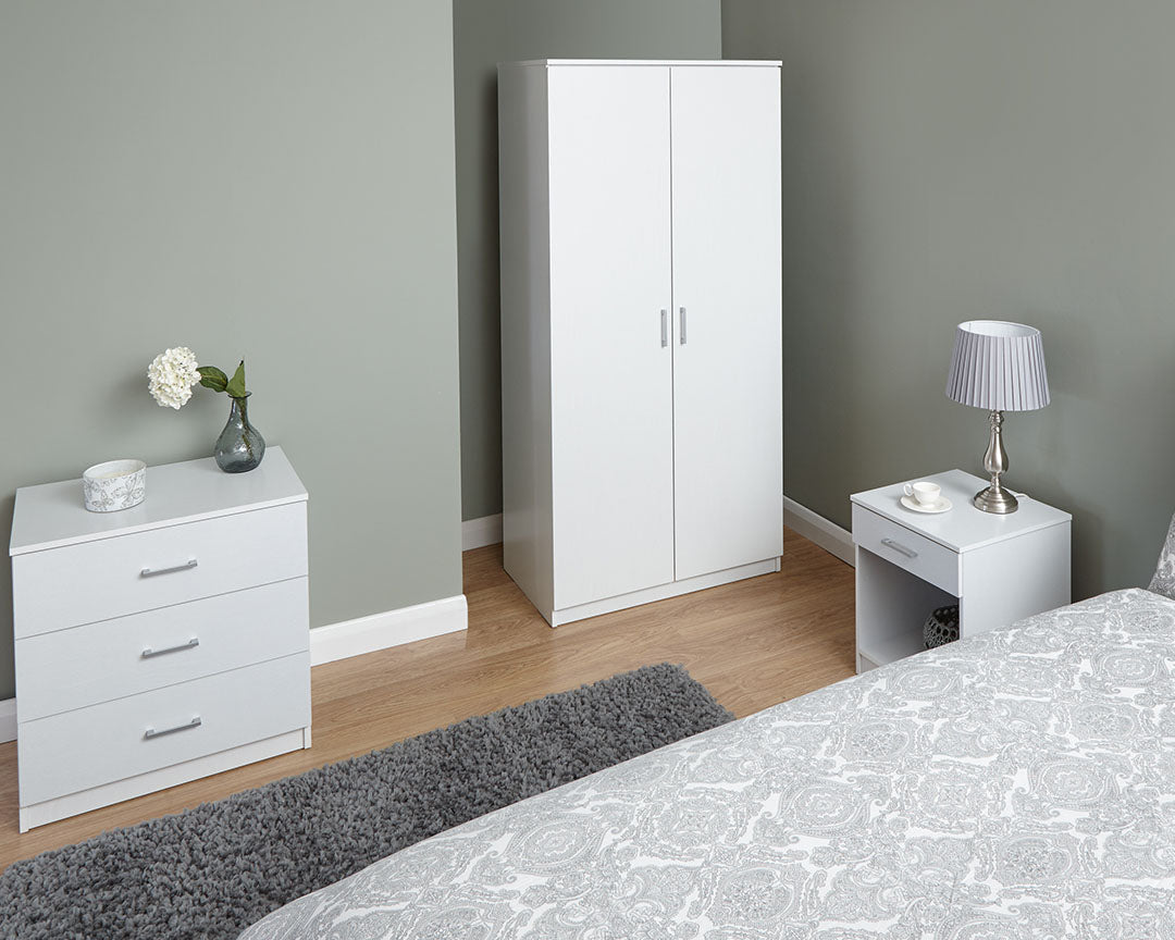 Budget Low Cost Bedroom Bundle in White. Includes Wardrobe, Chest of drawers and bedside. Easy Assembly.