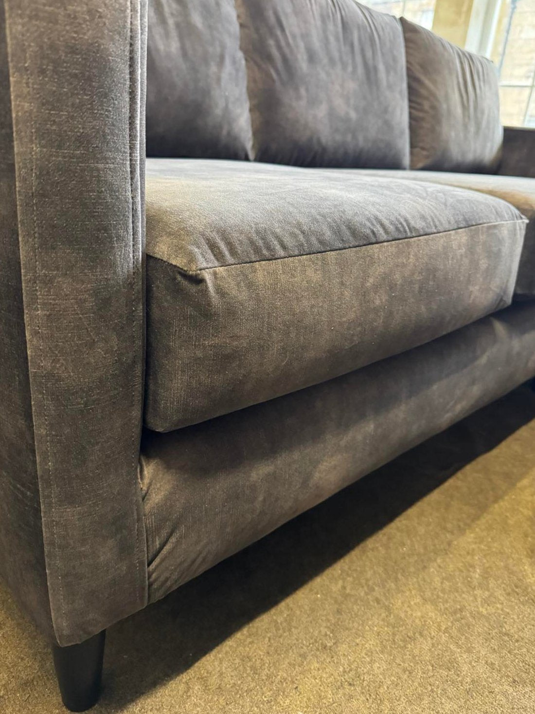 Vintage grey Loft corner chaise sofa on wooden stilted legs. Supportive foam seating. high quality craftsmanship 