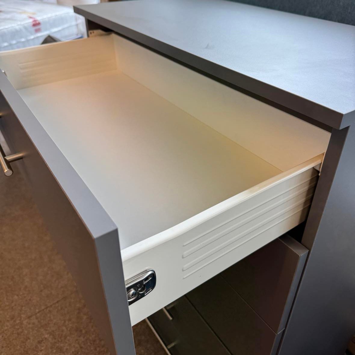 contract grate metal sides to 5 drawer chest. 18mm thick drawer bottoms. Perfect choice for a landlord in Lancaster & Morecambe looking to furnish their rental property with furniture that lasts.