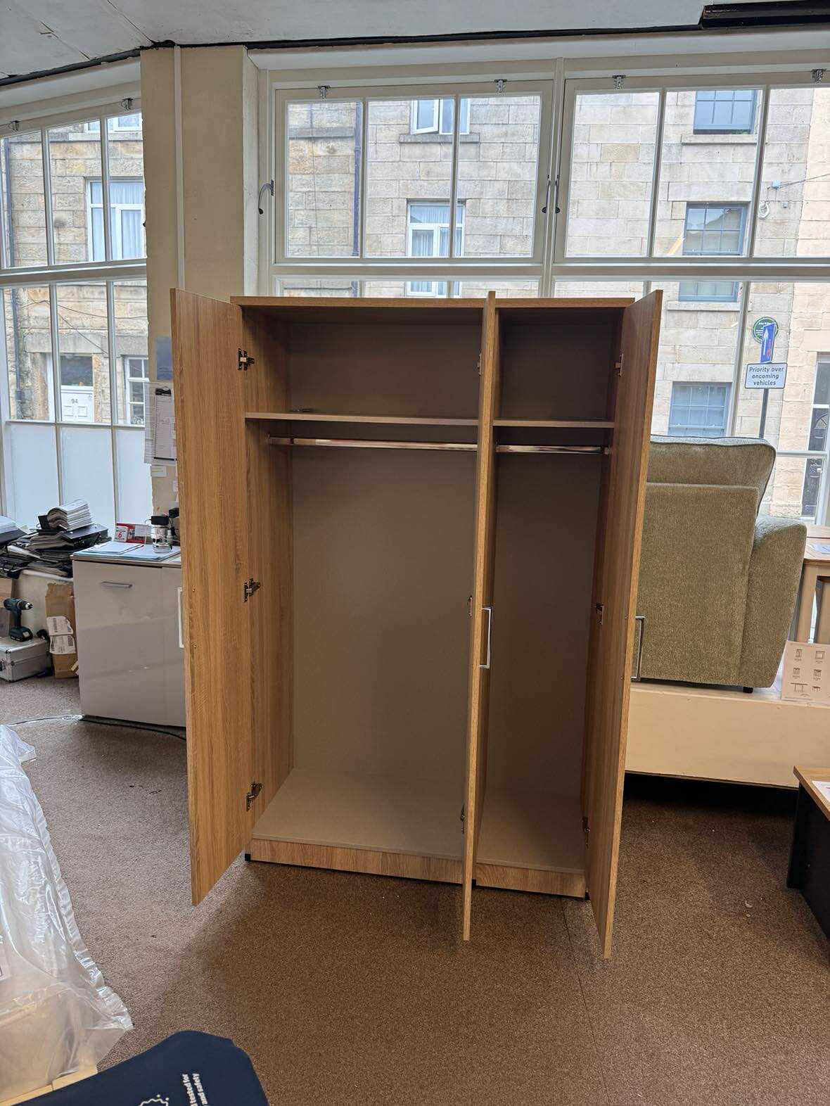 oak 3 door wardrobe open with double hanging space